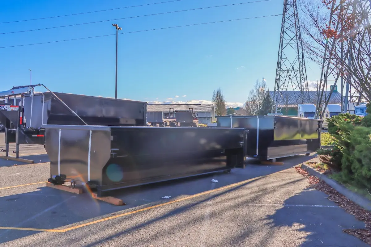 Roll-off dumpster ready for waste disposal at job site for 2 Yard Dumpster Rental in Riverside